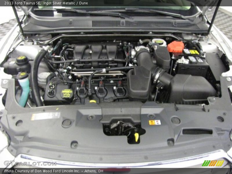 Ingot Silver Metallic / Dune 2013 Ford Taurus SE