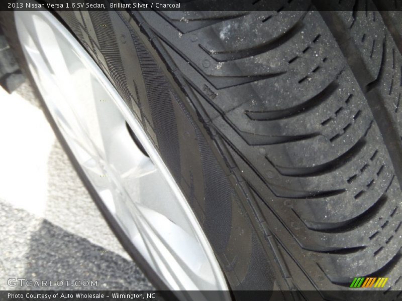 Brilliant Silver / Charcoal 2013 Nissan Versa 1.6 SV Sedan