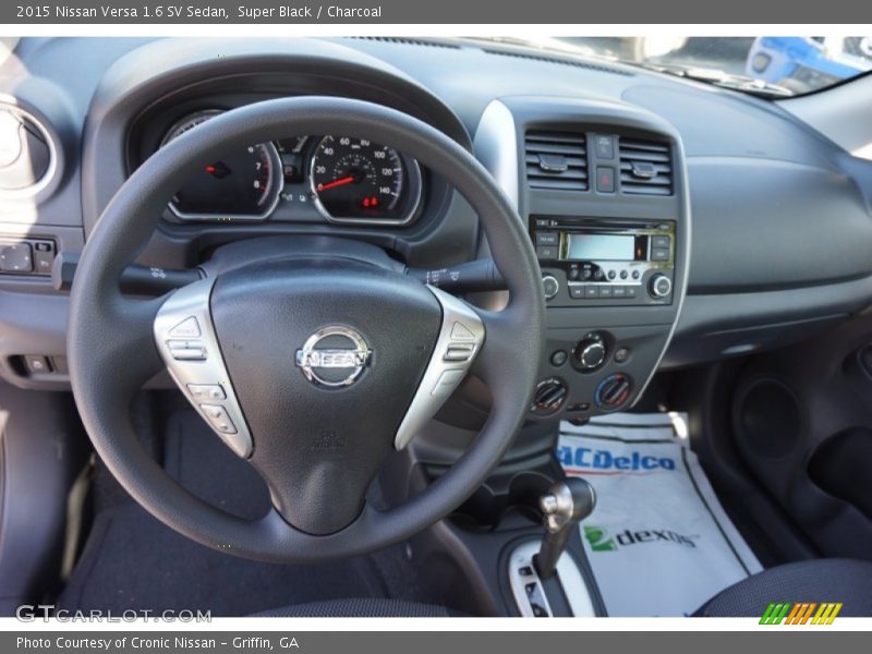 Super Black / Charcoal 2015 Nissan Versa 1.6 SV Sedan
