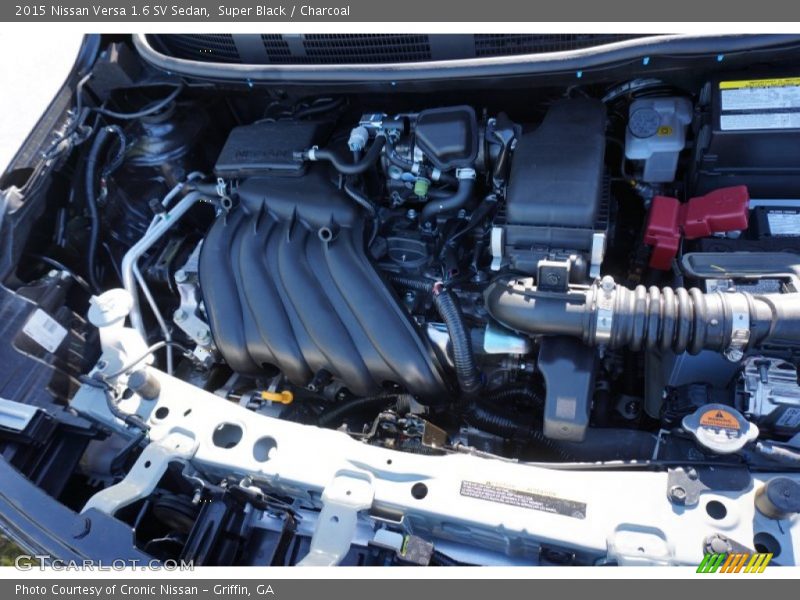 Super Black / Charcoal 2015 Nissan Versa 1.6 SV Sedan