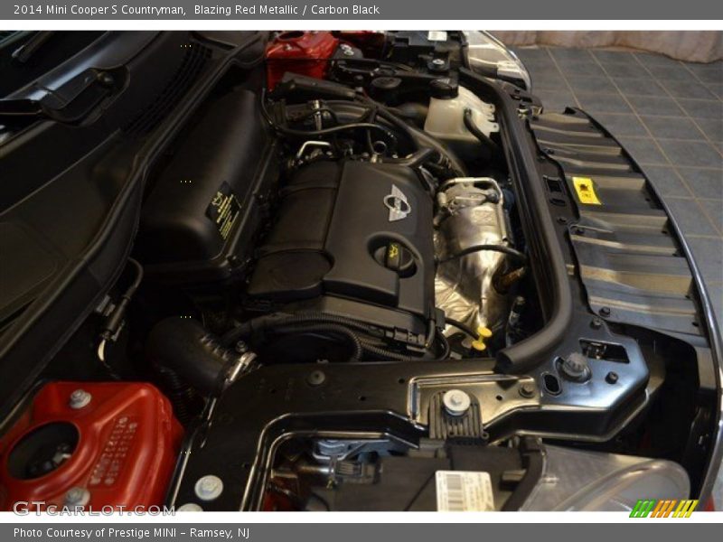 Blazing Red Metallic / Carbon Black 2014 Mini Cooper S Countryman