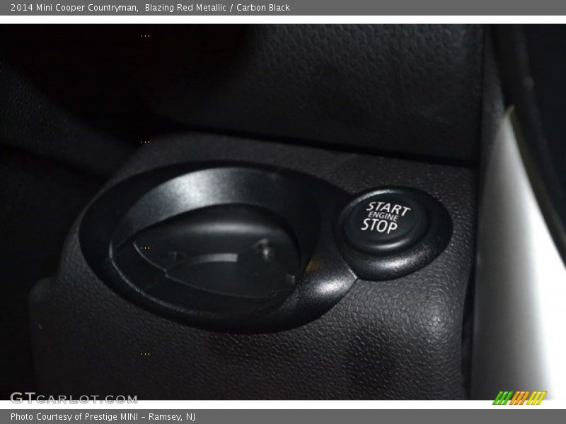 Blazing Red Metallic / Carbon Black 2014 Mini Cooper Countryman