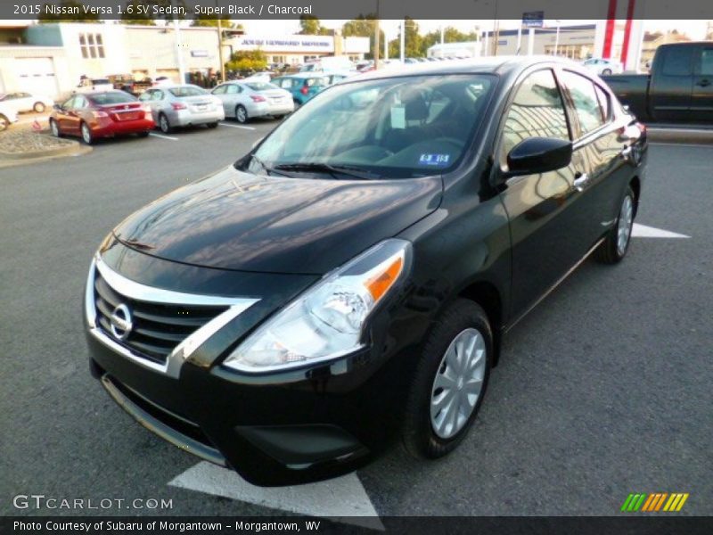 Super Black / Charcoal 2015 Nissan Versa 1.6 SV Sedan