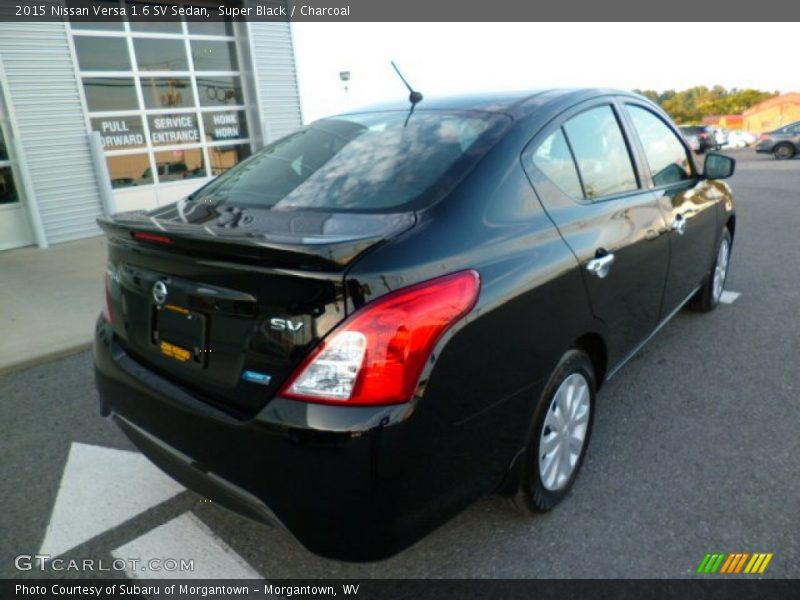 Super Black / Charcoal 2015 Nissan Versa 1.6 SV Sedan