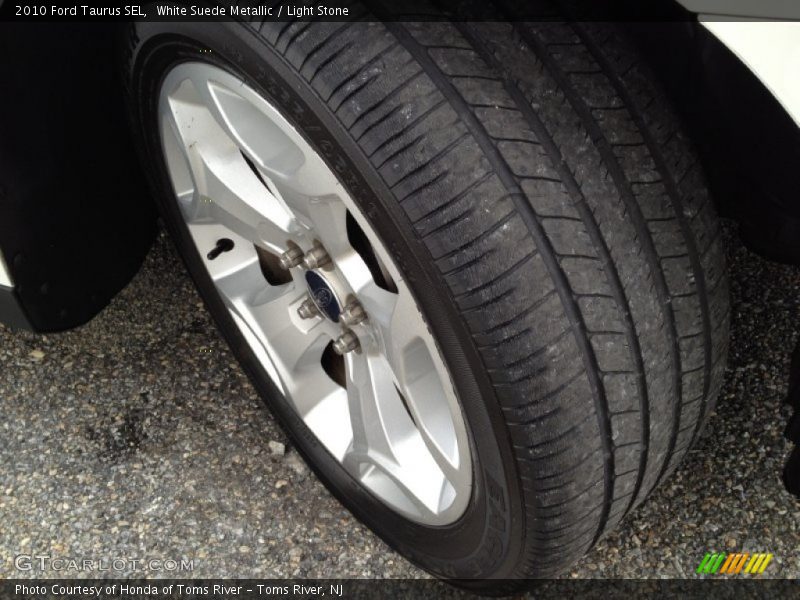 White Suede Metallic / Light Stone 2010 Ford Taurus SEL