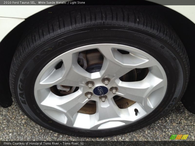 White Suede Metallic / Light Stone 2010 Ford Taurus SEL