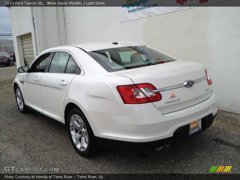 White Suede Metallic / Light Stone 2010 Ford Taurus SEL