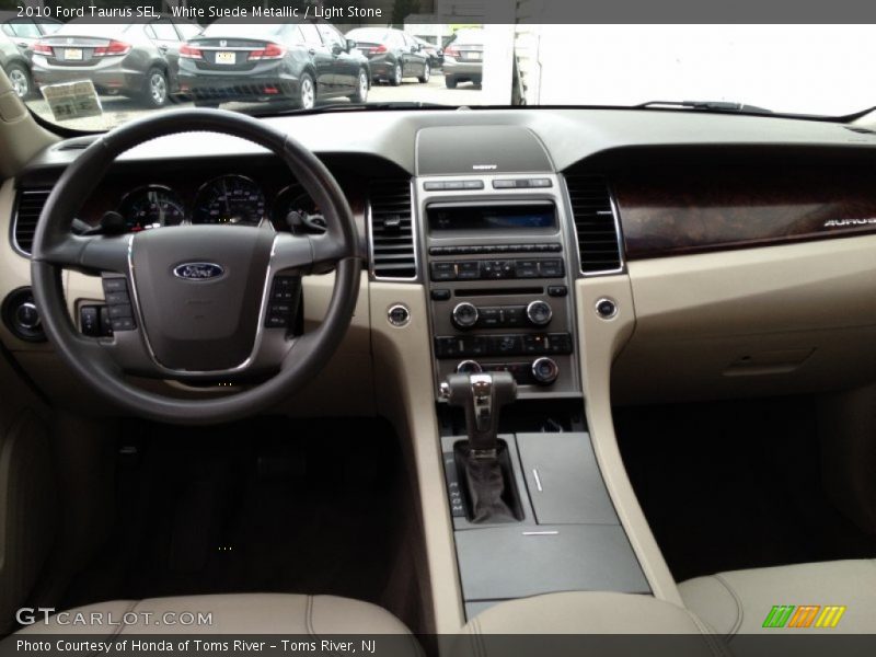 White Suede Metallic / Light Stone 2010 Ford Taurus SEL