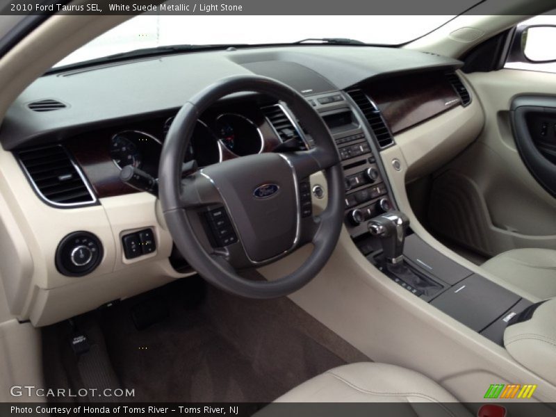 White Suede Metallic / Light Stone 2010 Ford Taurus SEL