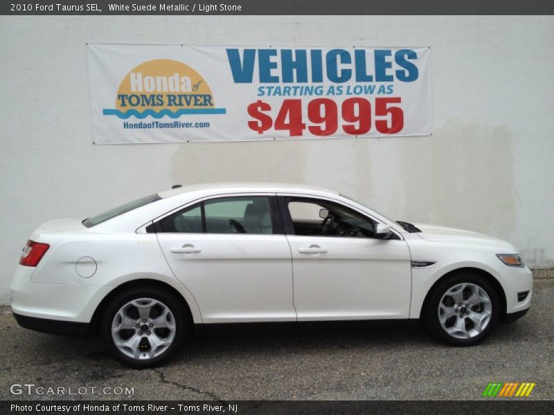 White Suede Metallic / Light Stone 2010 Ford Taurus SEL