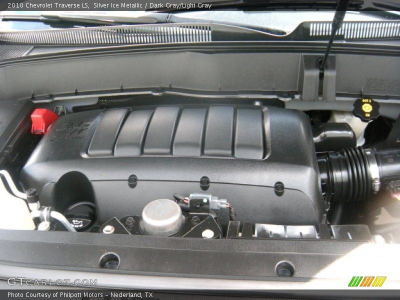 Silver Ice Metallic / Dark Gray/Light Gray 2010 Chevrolet Traverse LS
