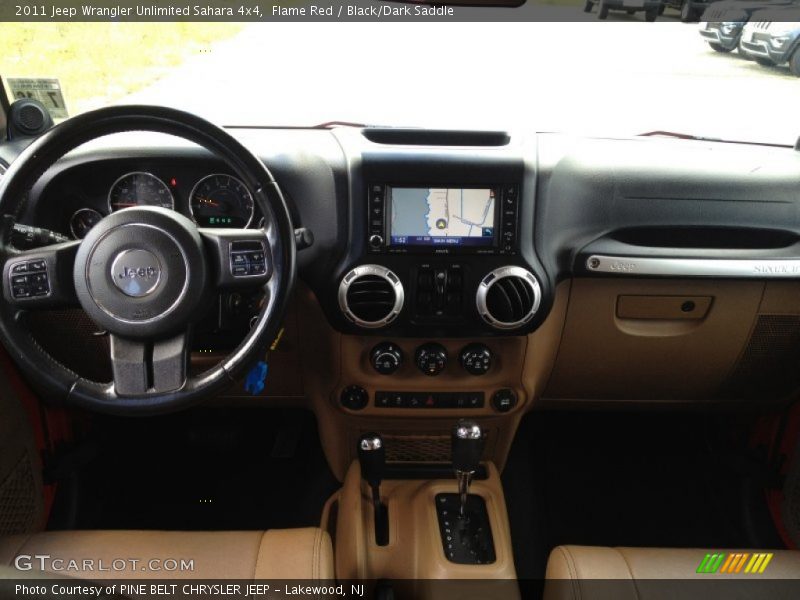 Flame Red / Black/Dark Saddle 2011 Jeep Wrangler Unlimited Sahara 4x4