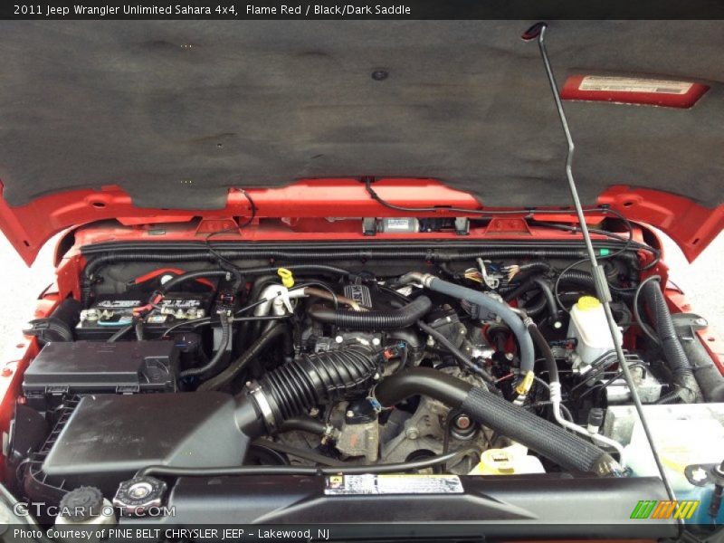 Flame Red / Black/Dark Saddle 2011 Jeep Wrangler Unlimited Sahara 4x4