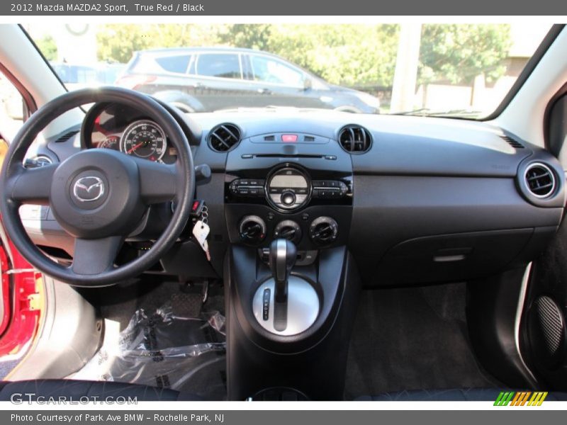 True Red / Black 2012 Mazda MAZDA2 Sport