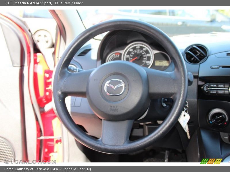 True Red / Black 2012 Mazda MAZDA2 Sport