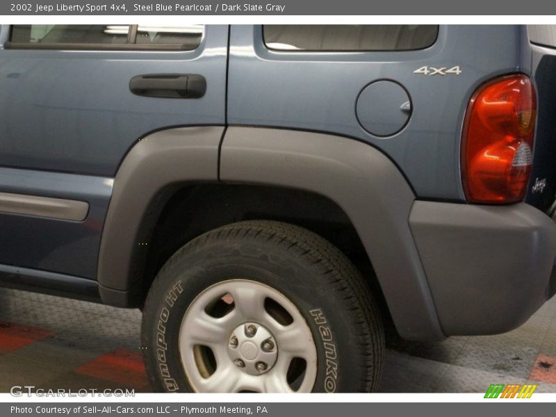 Steel Blue Pearlcoat / Dark Slate Gray 2002 Jeep Liberty Sport 4x4