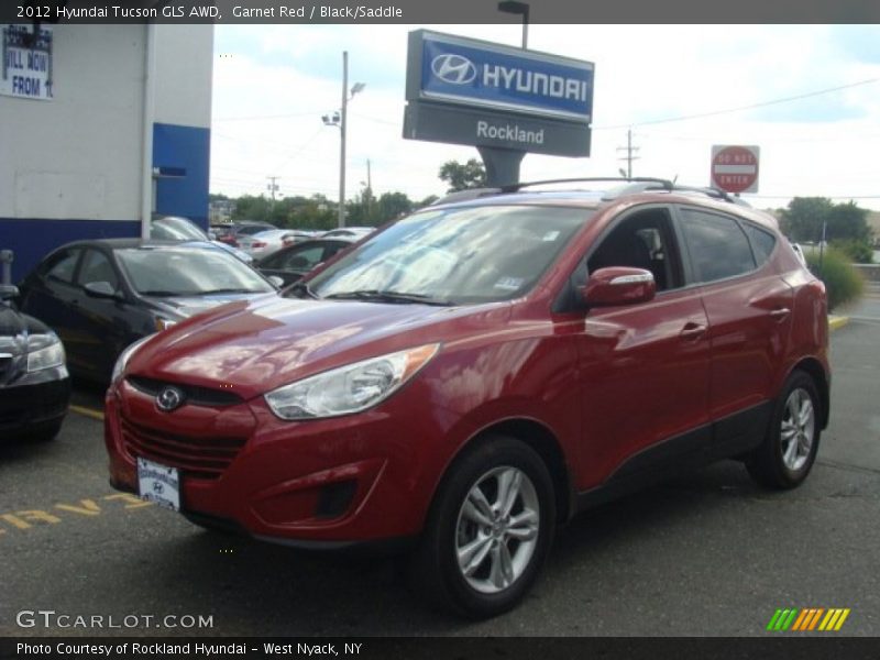 Garnet Red / Black/Saddle 2012 Hyundai Tucson GLS AWD