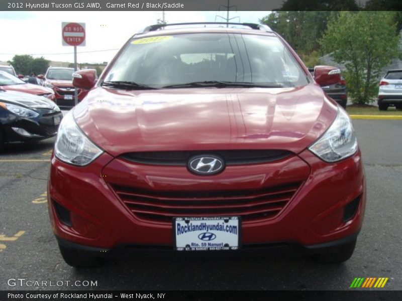 Garnet Red / Black/Saddle 2012 Hyundai Tucson GLS AWD
