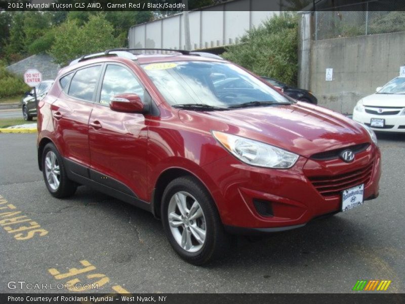 Garnet Red / Black/Saddle 2012 Hyundai Tucson GLS AWD