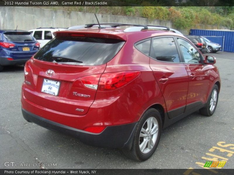 Garnet Red / Black/Saddle 2012 Hyundai Tucson GLS AWD