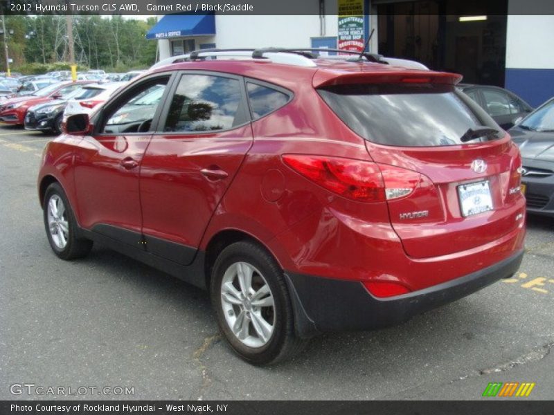 Garnet Red / Black/Saddle 2012 Hyundai Tucson GLS AWD