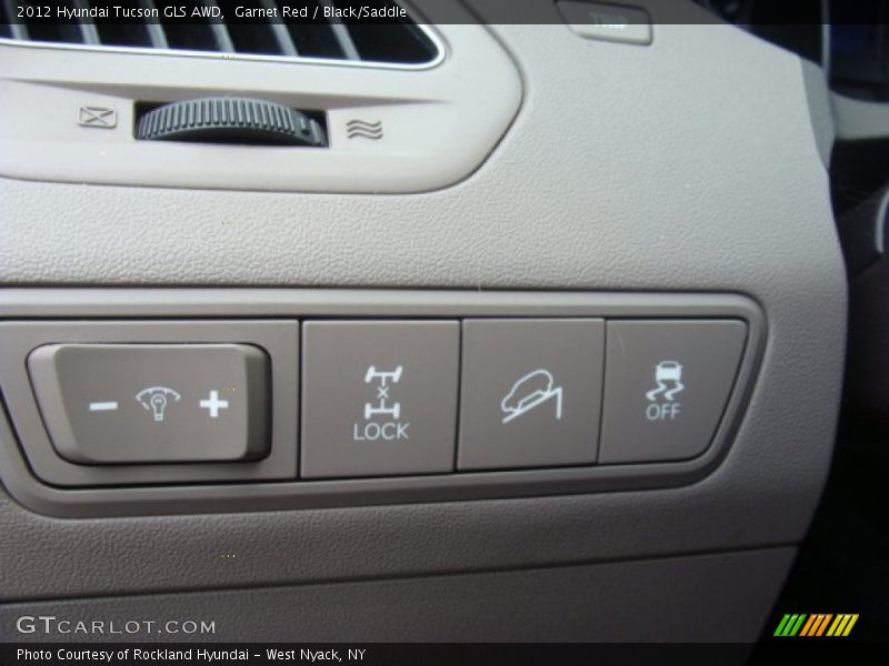Garnet Red / Black/Saddle 2012 Hyundai Tucson GLS AWD