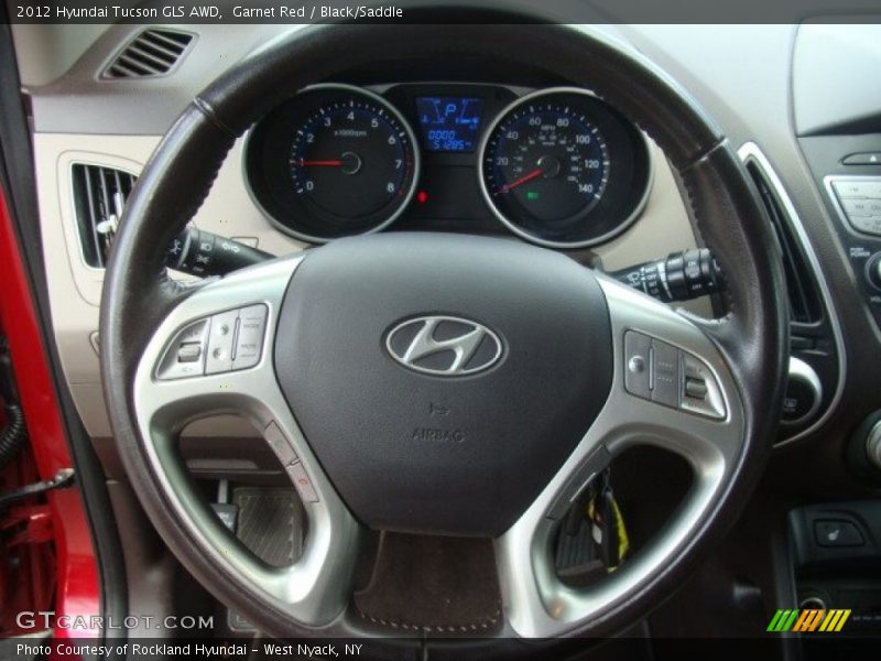 Garnet Red / Black/Saddle 2012 Hyundai Tucson GLS AWD