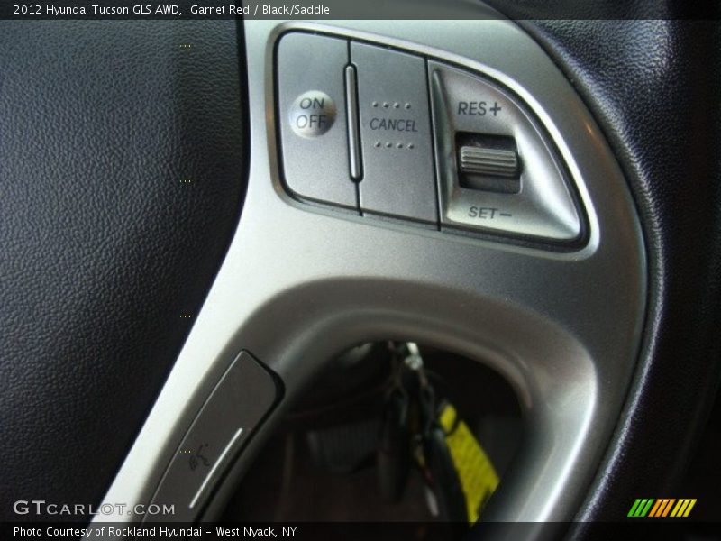 Garnet Red / Black/Saddle 2012 Hyundai Tucson GLS AWD