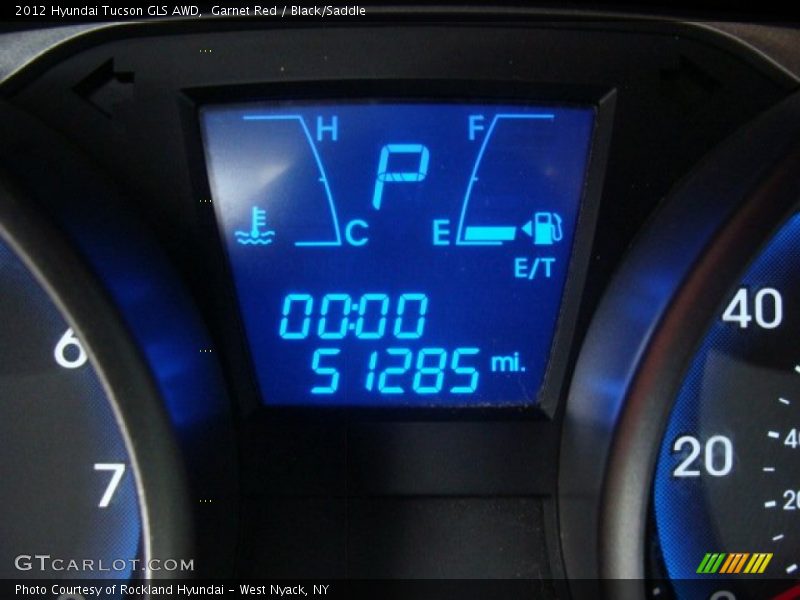 Garnet Red / Black/Saddle 2012 Hyundai Tucson GLS AWD
