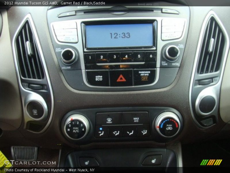 Garnet Red / Black/Saddle 2012 Hyundai Tucson GLS AWD
