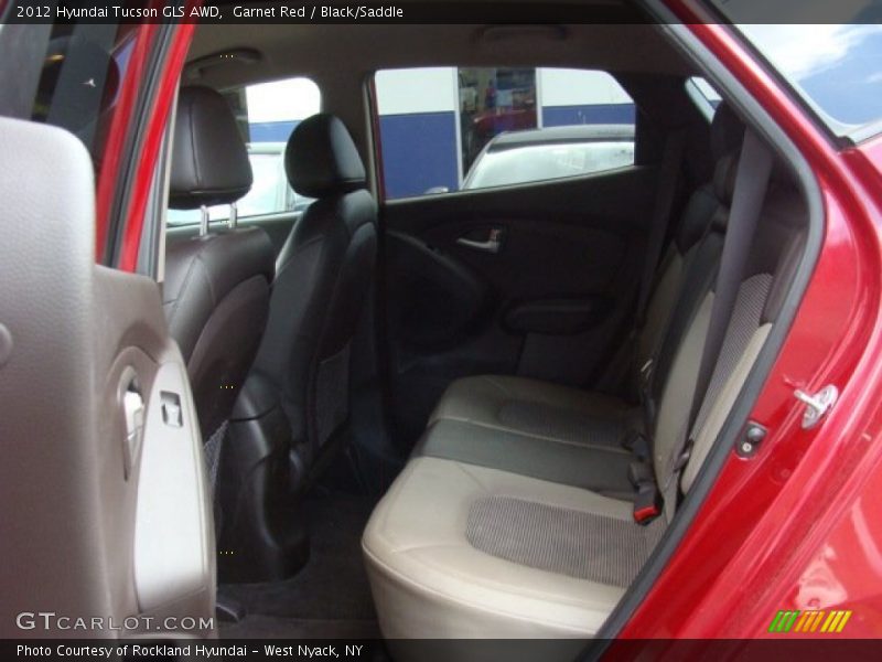 Garnet Red / Black/Saddle 2012 Hyundai Tucson GLS AWD