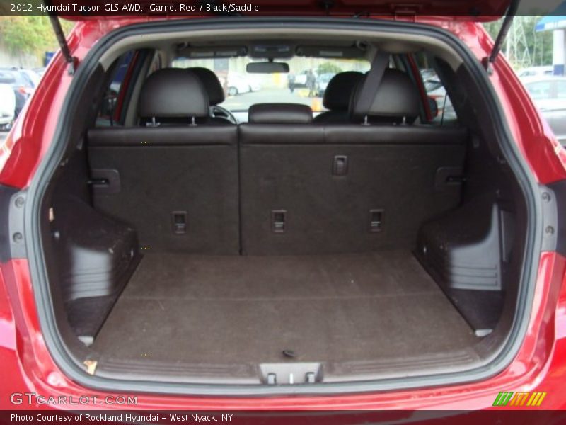 Garnet Red / Black/Saddle 2012 Hyundai Tucson GLS AWD