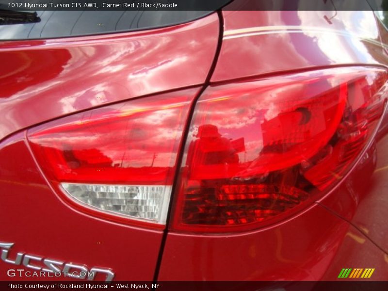 Garnet Red / Black/Saddle 2012 Hyundai Tucson GLS AWD