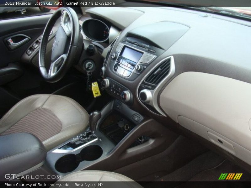 Garnet Red / Black/Saddle 2012 Hyundai Tucson GLS AWD