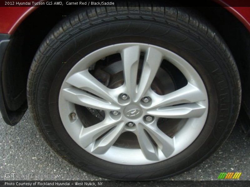 Garnet Red / Black/Saddle 2012 Hyundai Tucson GLS AWD