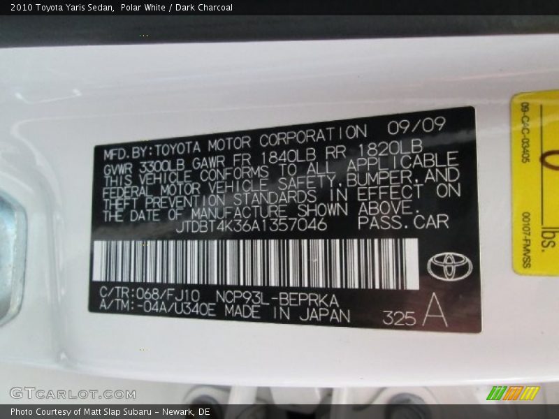 Polar White / Dark Charcoal 2010 Toyota Yaris Sedan