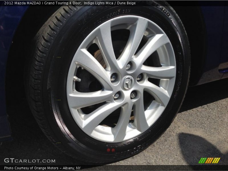 Indigo Lights Mica / Dune Beige 2012 Mazda MAZDA3 i Grand Touring 4 Door