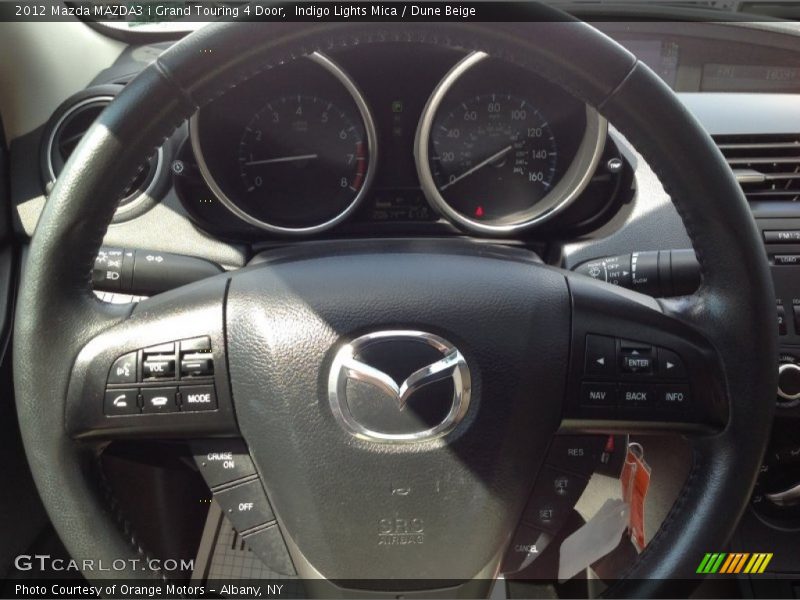 Indigo Lights Mica / Dune Beige 2012 Mazda MAZDA3 i Grand Touring 4 Door