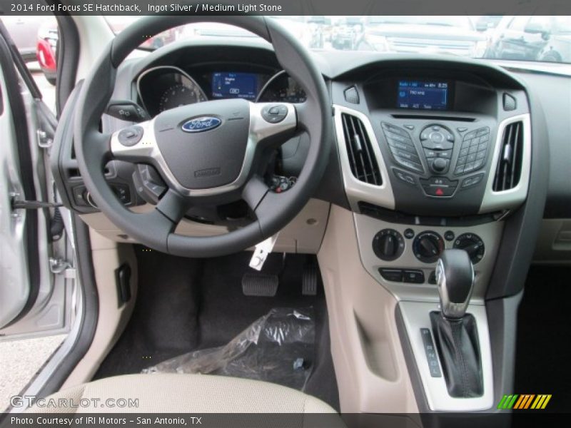 Ingot Silver / Medium Light Stone 2014 Ford Focus SE Hatchback