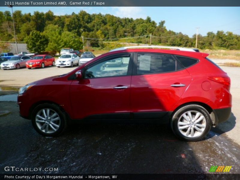 Garnet Red / Taupe 2011 Hyundai Tucson Limited AWD