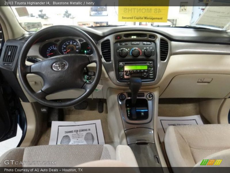 Bluestone Metallic / Ivory 2003 Toyota Highlander I4