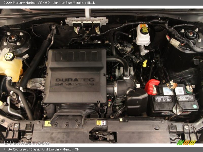 Light Ice Blue Metallic / Black 2009 Mercury Mariner V6 4WD