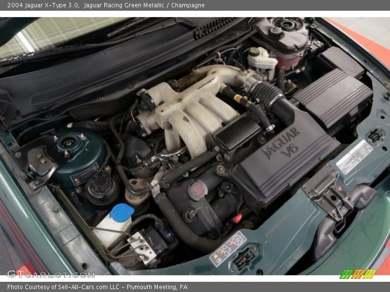 Jaguar Racing Green Metallic / Champagne 2004 Jaguar X-Type 3.0