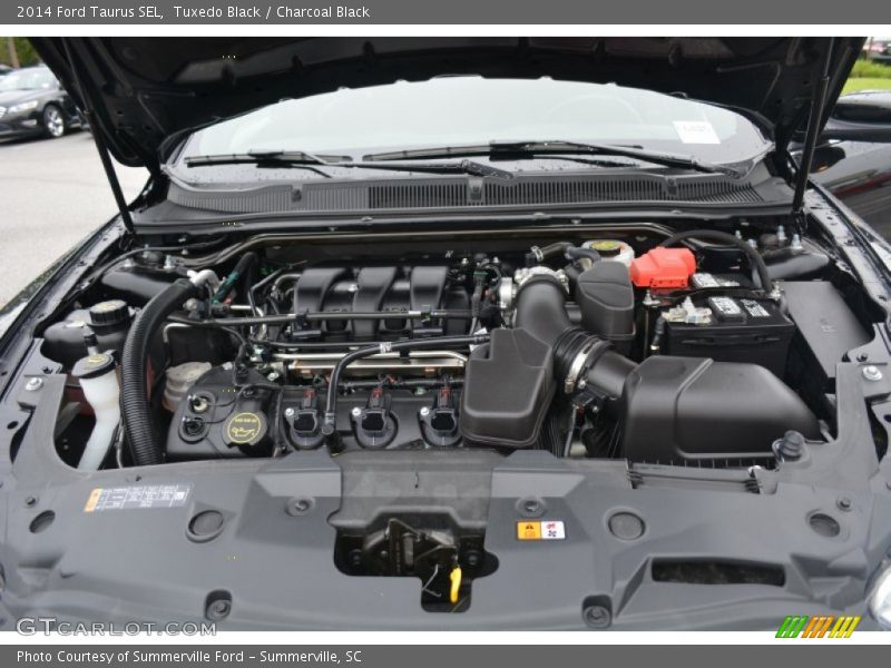 Tuxedo Black / Charcoal Black 2014 Ford Taurus SEL