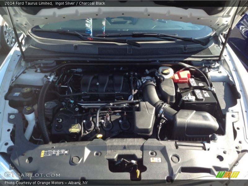 Ingot Silver / Charcoal Black 2014 Ford Taurus Limited