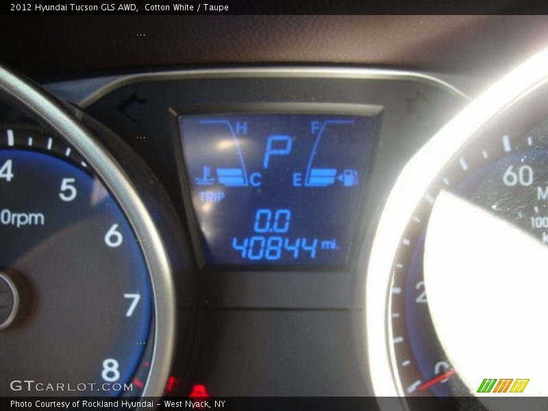 Cotton White / Taupe 2012 Hyundai Tucson GLS AWD