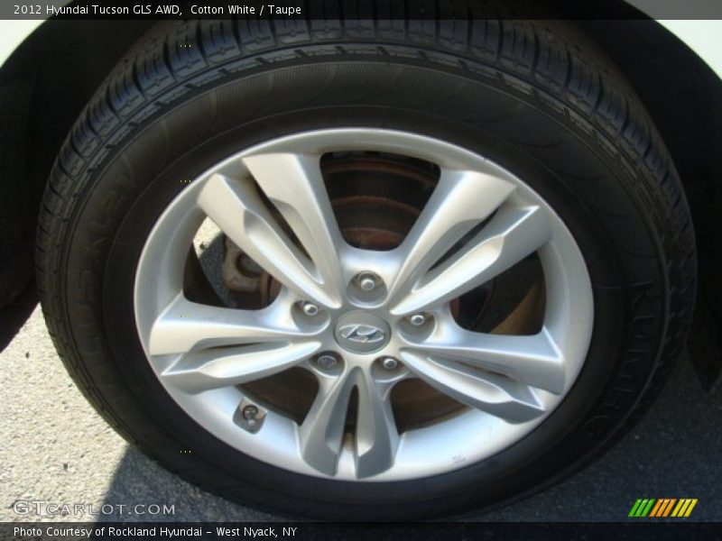Cotton White / Taupe 2012 Hyundai Tucson GLS AWD