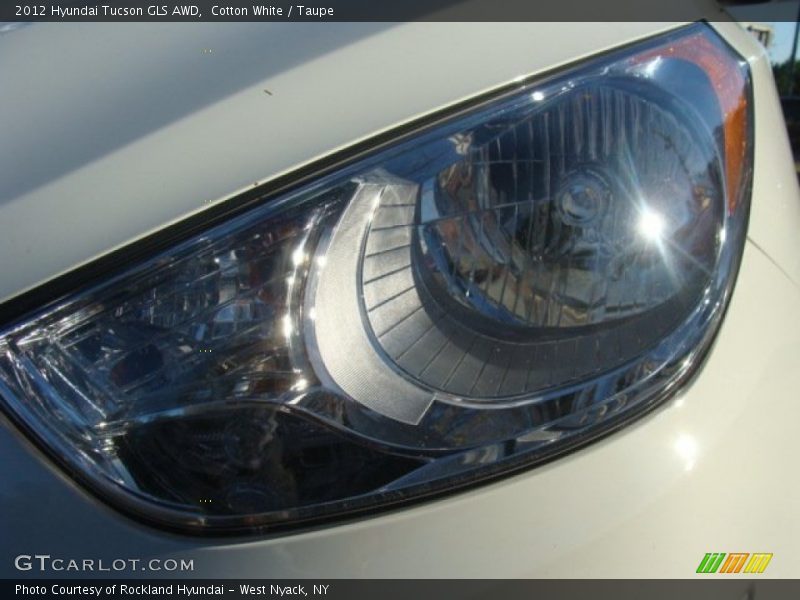 Cotton White / Taupe 2012 Hyundai Tucson GLS AWD
