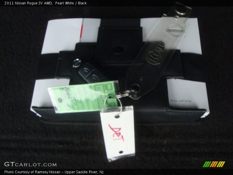 Pearl White / Black 2011 Nissan Rogue SV AWD