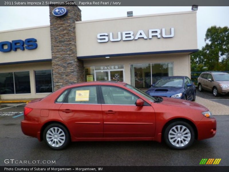 Paprika Red Pearl / Ivory 2011 Subaru Impreza 2.5i Premium Sedan